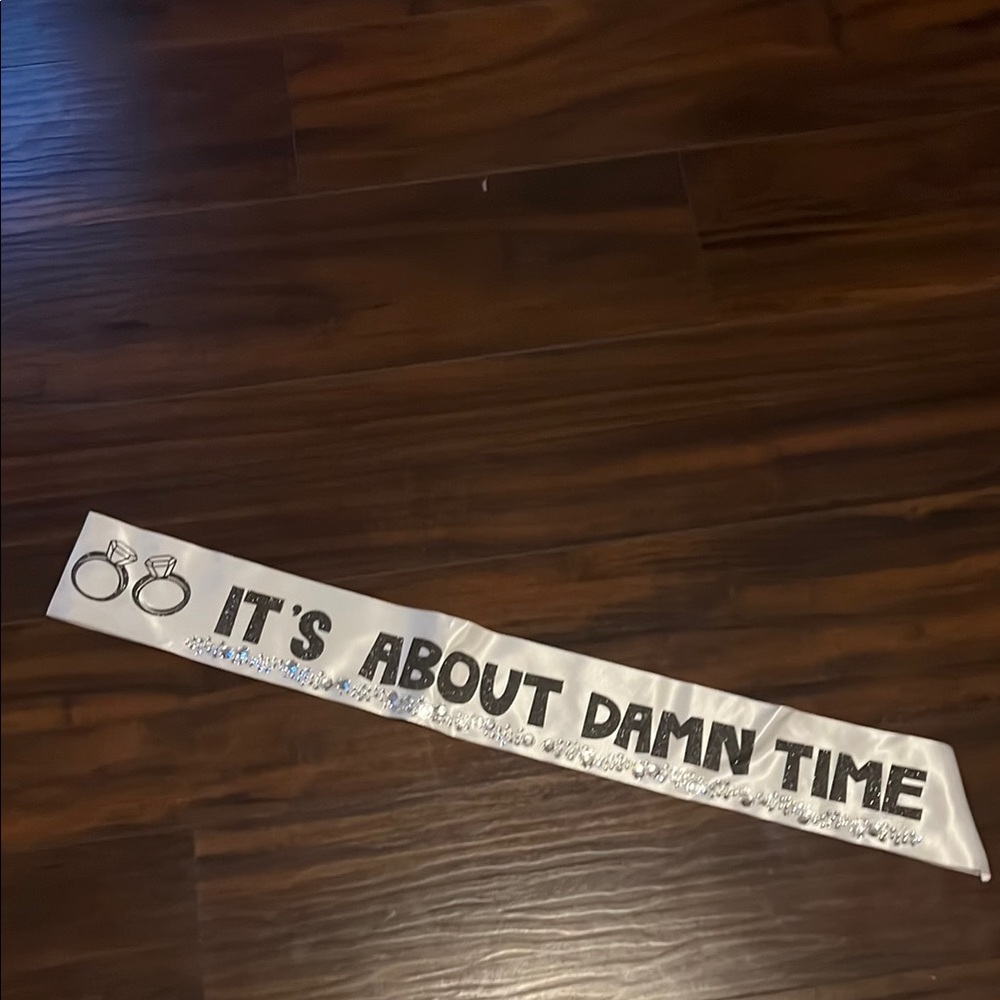 White Sash with Black Text